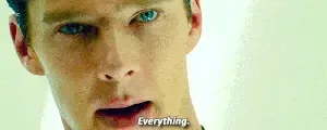 Close-up of a blue-eyed man speaking intently to camera, with a one-word caption